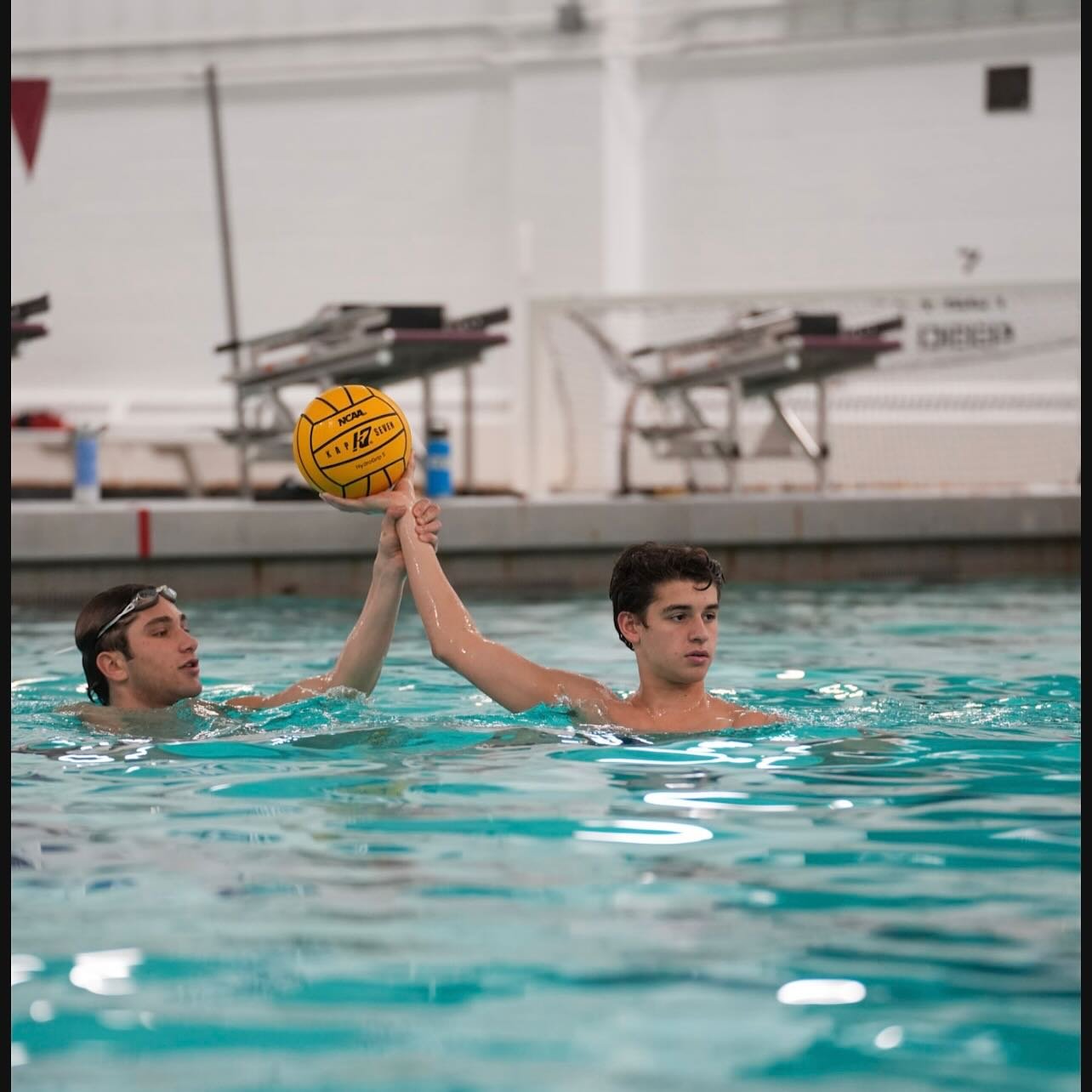 One of our athletes getting coaching from their D1 mentor